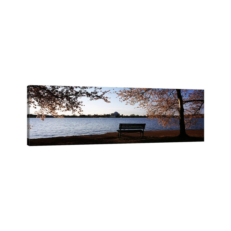 Park Bench With A Memorial In The Background, Jefferson Memorial, Tidal Basin - Wrapped Canvas Panoramic Print
