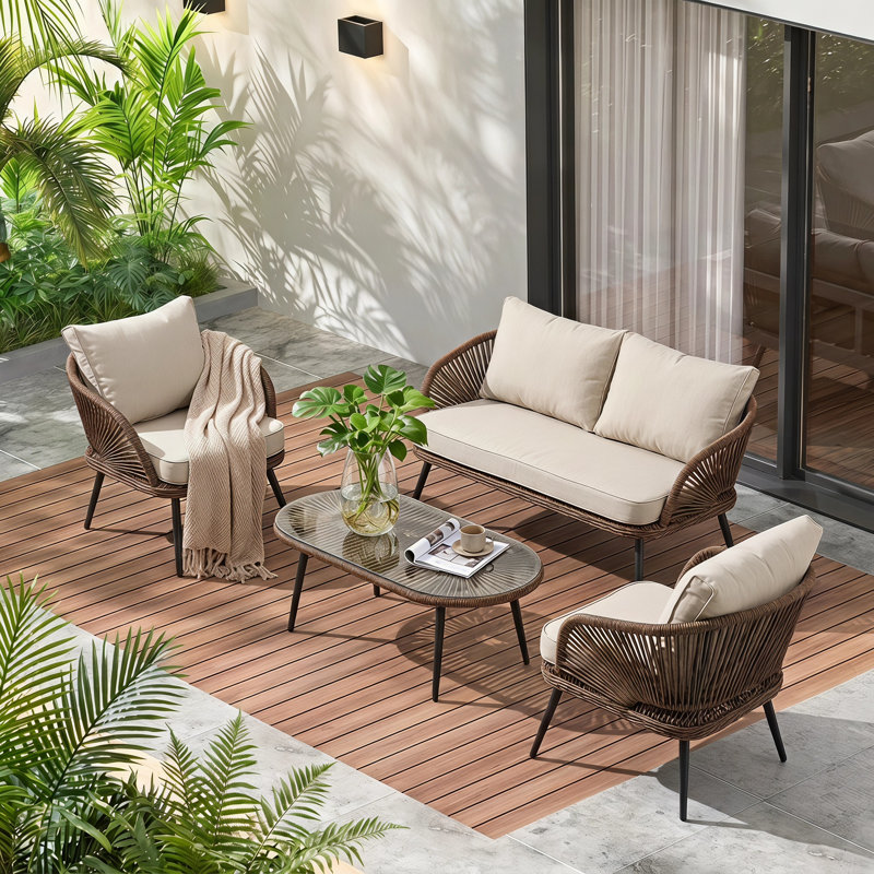 Ensemble de conversation d'extérieur en osier pour 4 personnes avec table basse et coussins