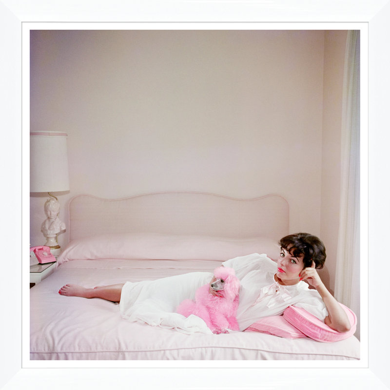 Joan Collins Relaxes Print by Slim Aarons, 36" H x 36" W x 1.5" D, White Single Picture Framed