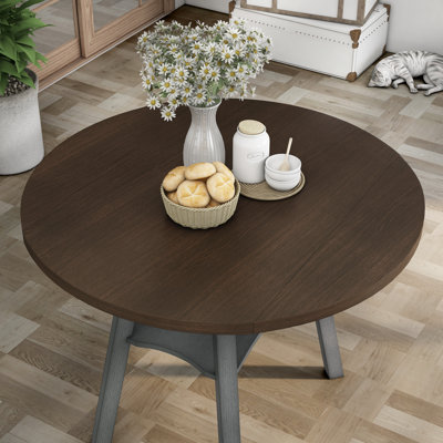 Hadrie Extendable Round Solid Wood Base Dining Table