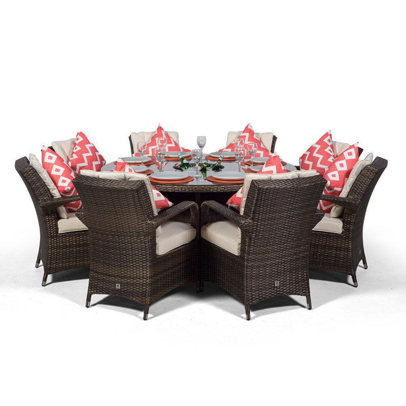 Karas 8 - Person Wicker Patio Dining Set with Round Table , Cushions Included, Brown