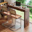 Élégante table de bar en bois de noyer naturel avec tiroirs doubles, idéale pour une décoration moderne et une utilisation multifonctionnelle