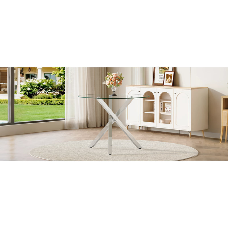 Table de salle à manger élégante en verre, structure en métal durable, parfaite pour les petits espaces