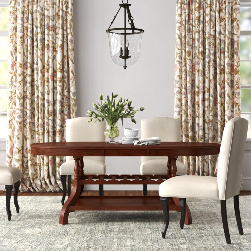 Fadhel Extendable Oval Solid Wood Base Dining Table