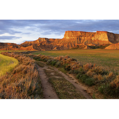 Sunset In The Bardenas R, Navarra, Spain by Jarcosa - Wrapped Canvas Print