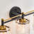 Harlune 3-light 23.25’’l Vanity Light Black And Gold Finish With Textured Glass Shade