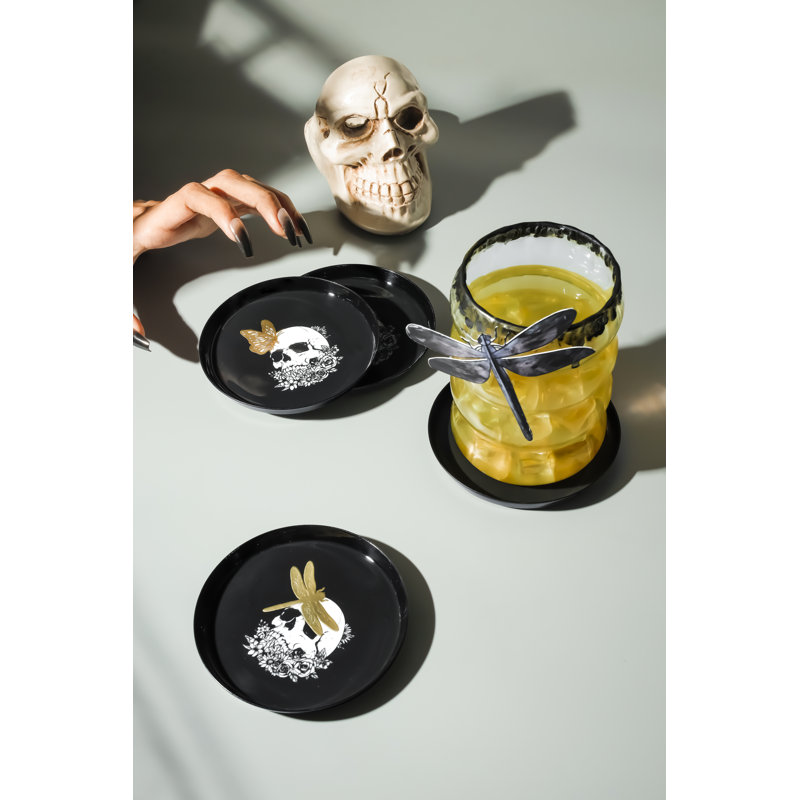 Ensemble de 4 sous-verres en métal doré à motif de crâne Nocturne