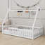 Lit simple en bois en forme de tente avec garde-corps-544387884