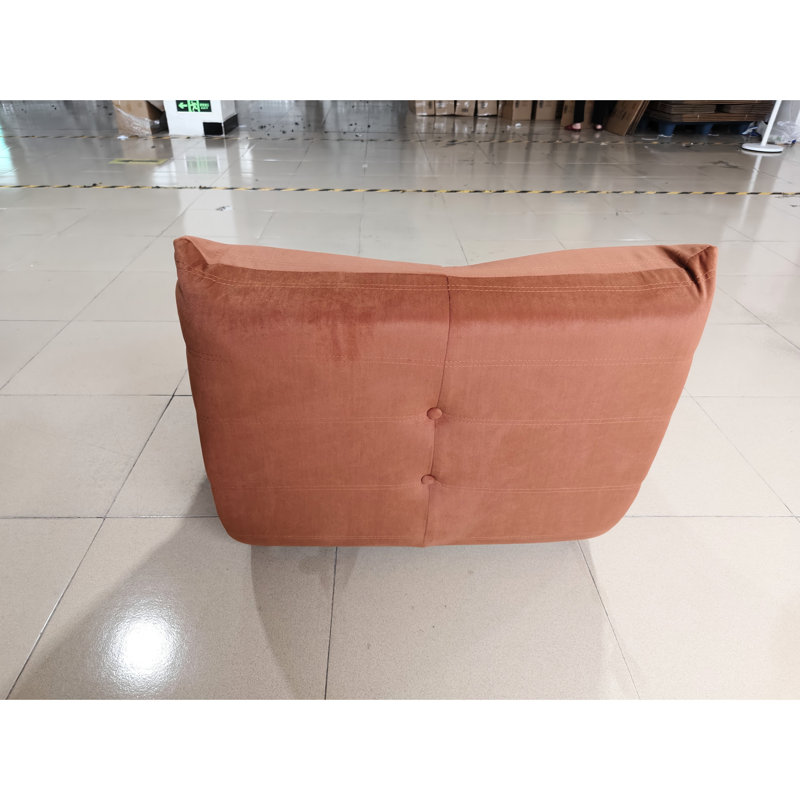 Fauteuil confortable orange avec boutons, mousse à mémoire de forme douce, assise coulissante, rembourrage en mousse