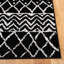 Tapis noir / ivoire à motif géométrique Cobos-1854513887