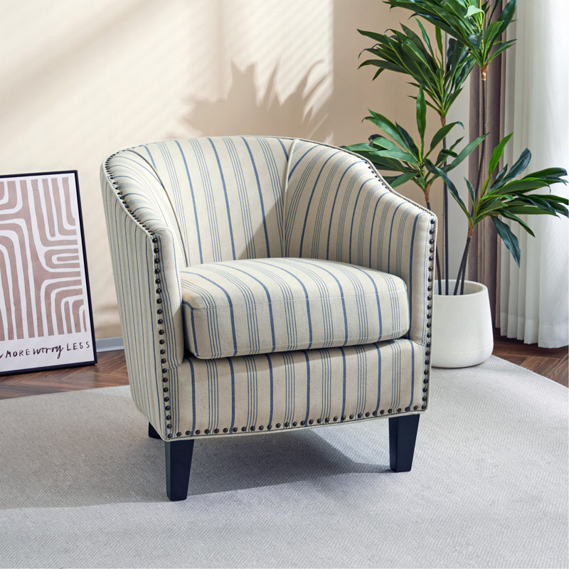 Fauteuil demi-tonneau rembourré à rayures
