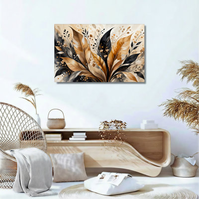 Toile abstraite, feuilles dorées et noires avec jets floraux