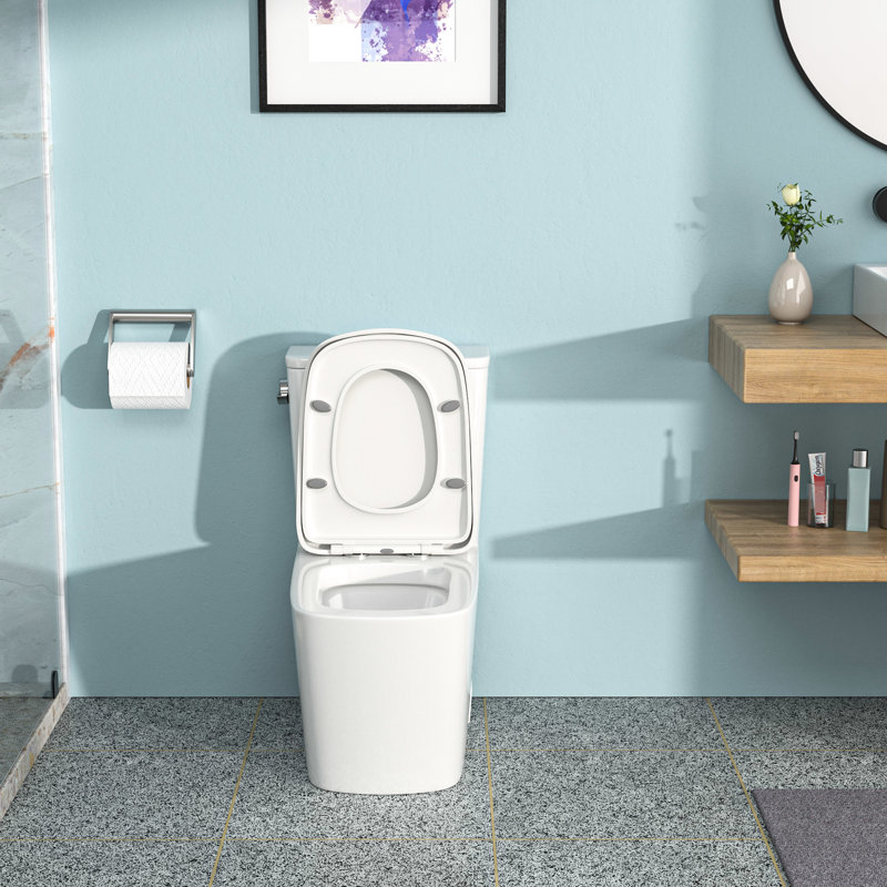 Toilette en céramique moderne avec chasse d'eau silencieuse et hygiénique - siège à fermeture douce, chasse d'eau à siphon, faible absorption d'eau, finition une pièce assainie et impeccable