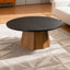 Table basse ronde avec base piédestal robuste, facile à assembler pour les salons modernes et les espaces confortables.