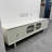 Elegant TV stand with smooth rounded edges-106447131