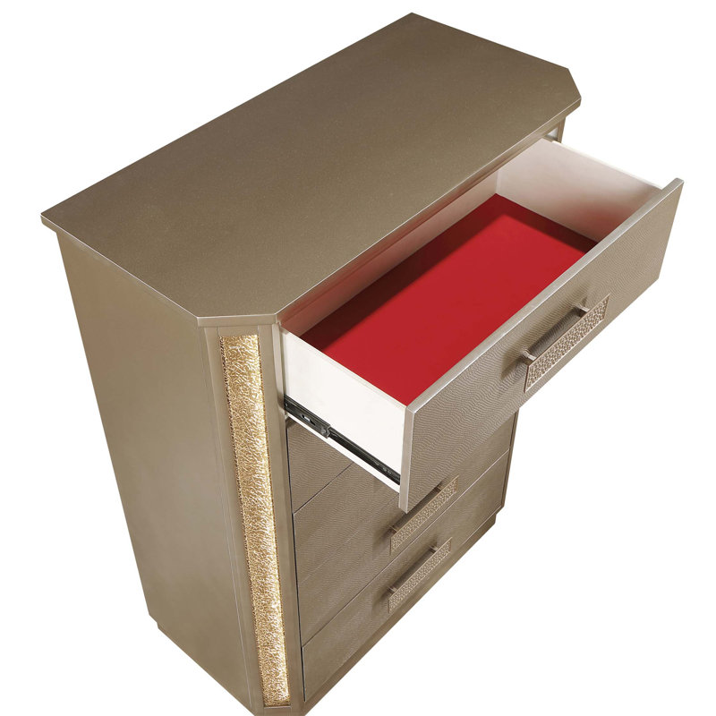 Commode Medusa avec cinq tiroirs spacieux et un éclairage à DEL, une finition dorée et cuivrée éblouissante, idéale pour les solutions de rangement élégantes.