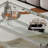 Tempered glass coffee table with double layers and mirror-finished stainless steel frame, durable and elegant