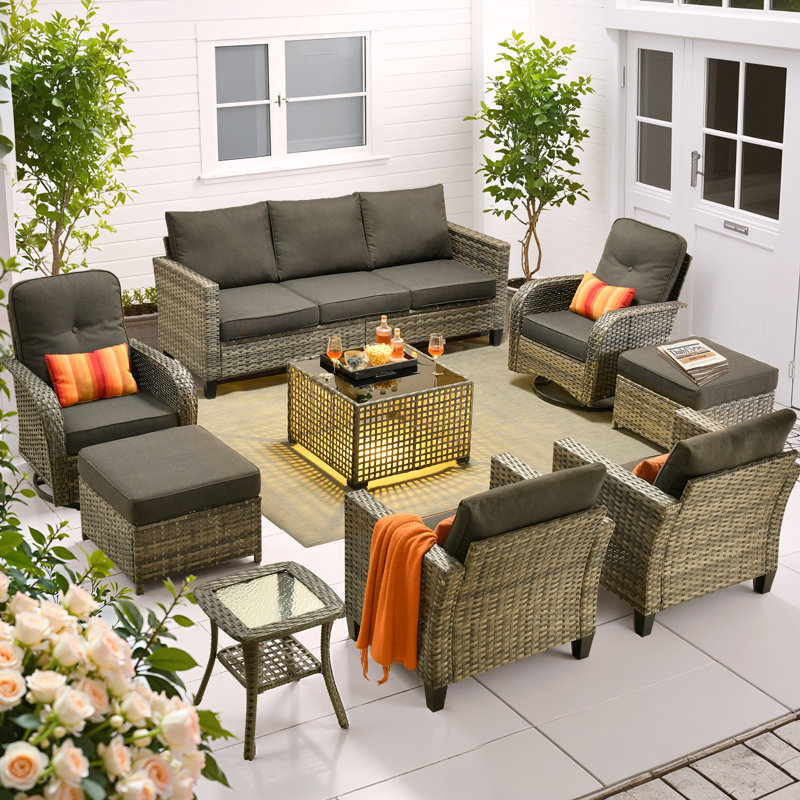  All - Weather Wicker Outdoor Furniture Set, Comfortable 9 - Piece Patio Seating Group with Rotating Chairs, Sofa Illuminated Coffee Table & Ottomans