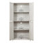 Armoire de rangement haute autoportante avec portes sculptées en miroir acrylique et étagères réglables pour répondre aux besoins d'organisation des maisons modernes.