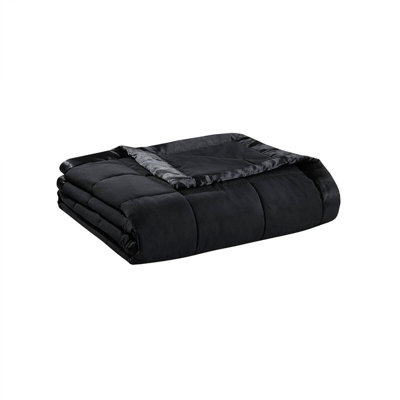 Couverture légère en duvet synthétique avec bordure en satin