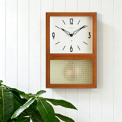 Horloge murale rectangulaire en bois fini noyer