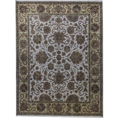 Tapis ivoire et doré de haute qualité noué à la main
