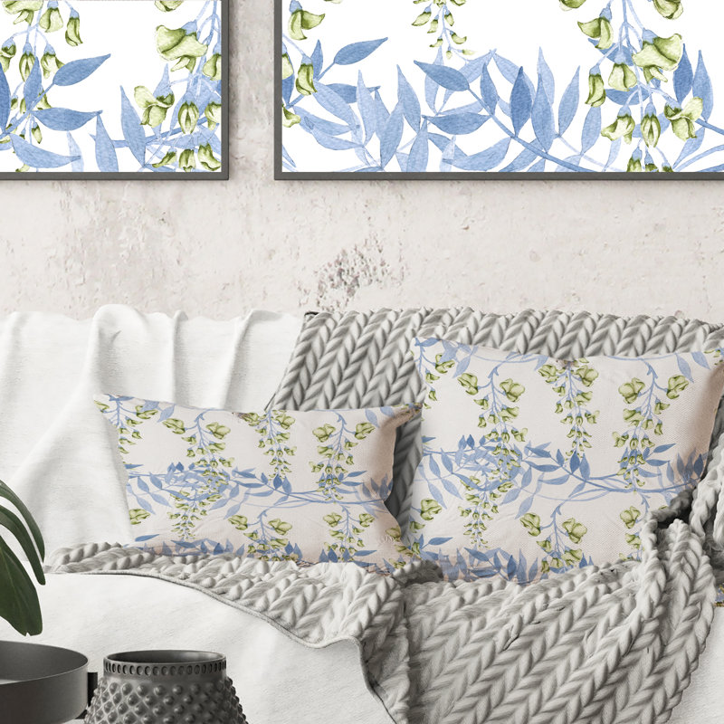 Coussin décoratif jaune à motif de fleurs jaunes sur une branche de glycine