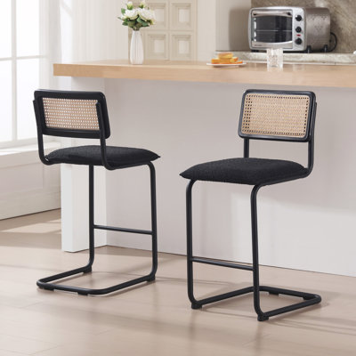 Ambrine Low Back Boucle Upholstered Counter/Bar Stool with Rattan Back and Steel Sled Frame