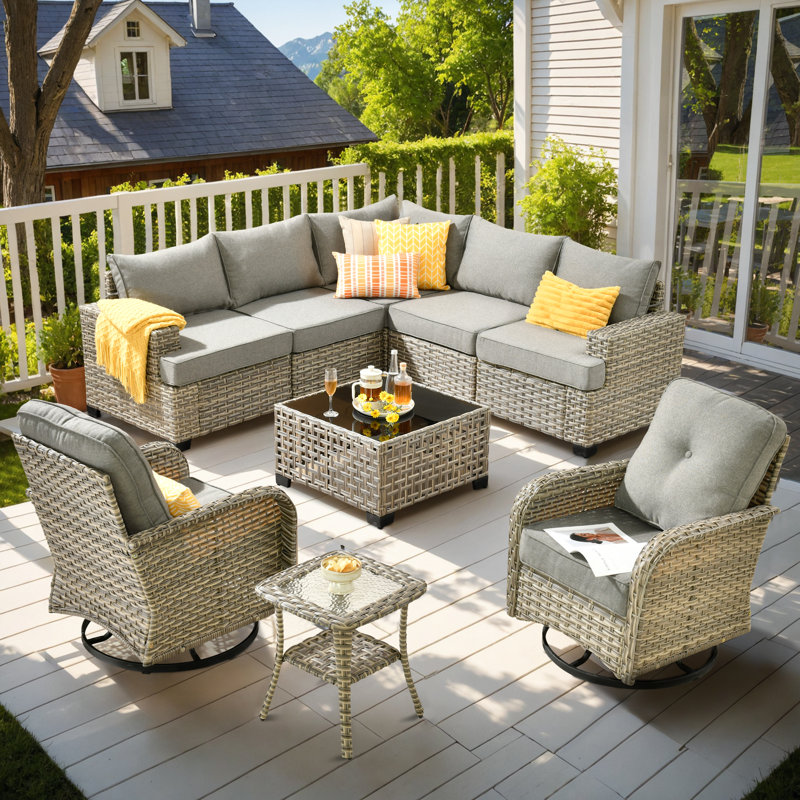 Ensemble de conversation modulaire en rotin avec coussins Wahkon pour 7 personnes avec table basse éclairée et chaises pivotantes