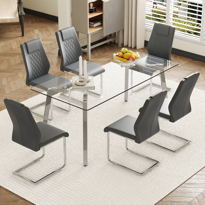 Ensemble de table de salle à manger rectangulaire élégant 71 x 35 avec plateau en verre trempé et 6 chaises en cuir synthétique