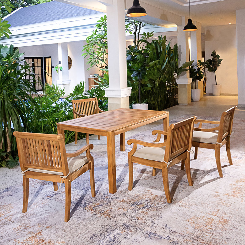 Korie Messer 4 - Person Rectangular Teak Patio Dining Set With Cushions