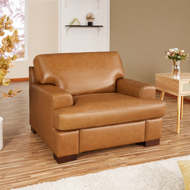 https://assets.wfcdn.com/im/34129016/resize-h755-w755%5Ecompr-r85/2423/242322376/Daryon+Leather+Club+Accent+Chair+-+Luxurious+Comfort%2C+Goose+Feather+Cushion+Filling%2C+Square+Arm+Design.jpg