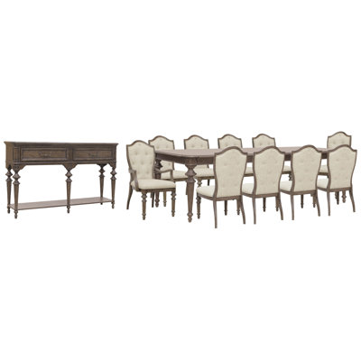 Table de salle à manger extensible avec 8 chaises rembourrées, 2 fauteuils et un buffet.