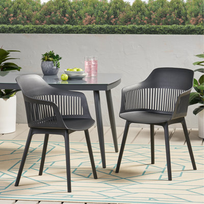 Chaise d'extérieur - Dahlia. Plastique noir. Structure météo. 33 po x 22,5 po x 21,5 po Design moderne et élégant Dahlia:, sélection élégante. 21,5 po, polypropylène