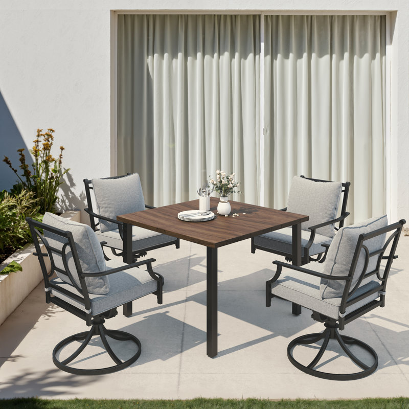 Ensemble repas pour 4 personnes avec table en acier et fauteuils pivotants rembourrés Sailor