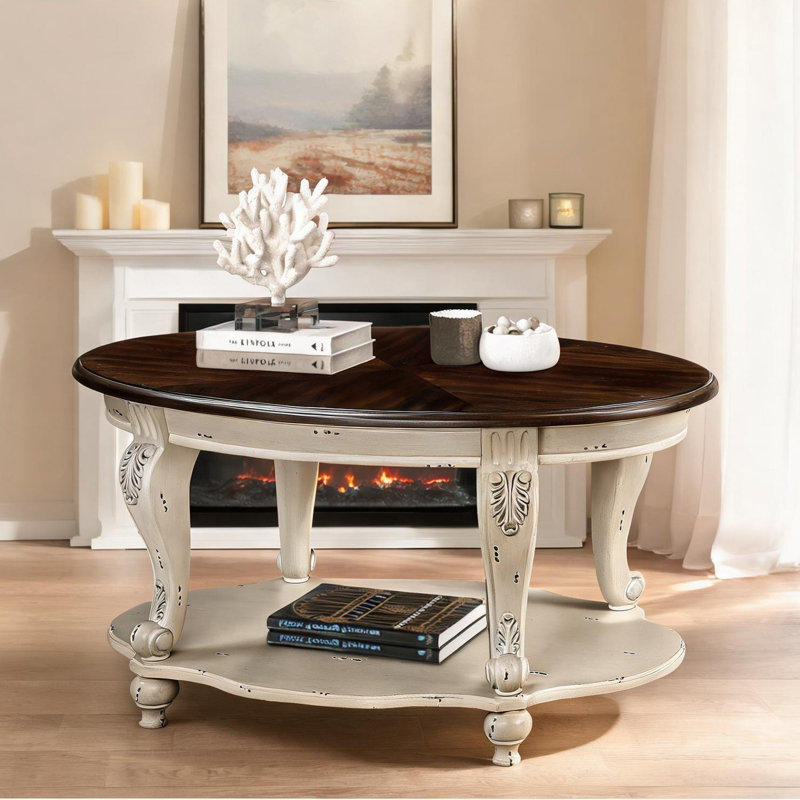 Table basse ovale de 42 pouces, plateau beige chaud avec base espresso, rangement ouvert à deux niveaux, fabrication en bois massif pour le salon