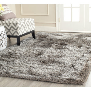 https://assets.wfcdn.com/im/34144022/resize-h300-w300%5Ecompr-r85/1368/136888841/Sanisha+Hand+Tufted+Solid+Color+Indoor+Rug.jpg
