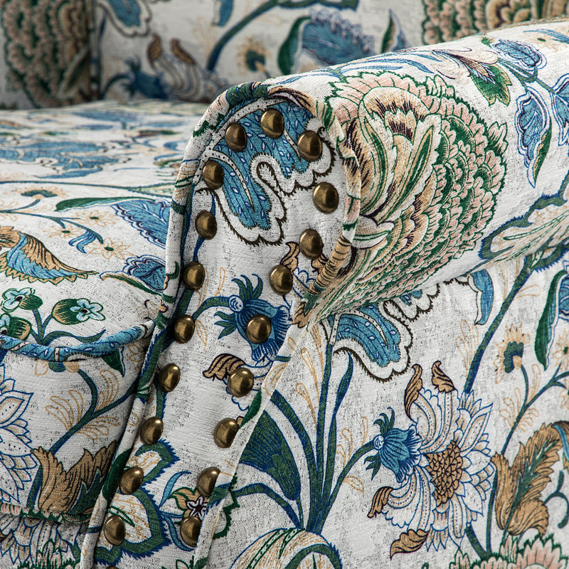Fauteuil Asul avec garniture cloutée, Mélange de polyester vert