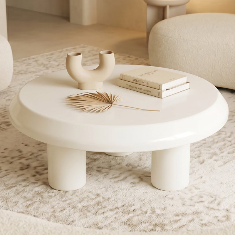 Table basse d'intérieur crème avec table basse et 3 pieds pour le salon