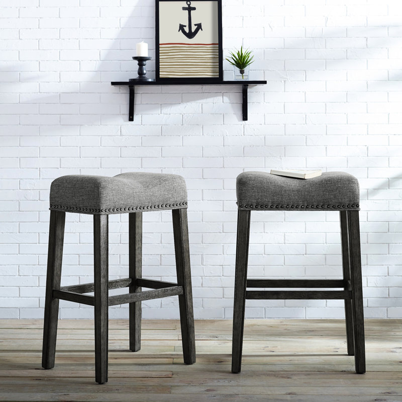 Gray Backless Saddle Seat Bar Stools, 29" Height, Of 2. Made Genuine Wood With Weathered Finish. Upholstered In Grey. Contemporary Style For Home. 18"W X 13"D 29"H. Some Assembly Needed 29". Real