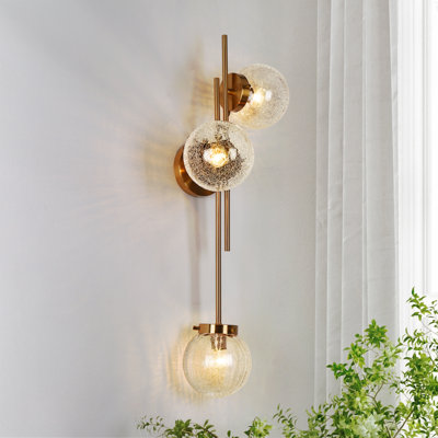 Jenavicia 30" H 3-Light Brass Metal Armed Sconce with Hand-Blown Cracked Glass Shades 