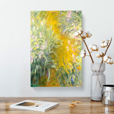 The Path Through The Irises by Claude Monet - Wrapped Canvas