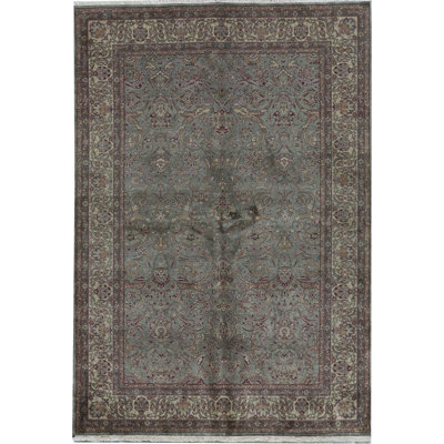 Tapis vert et doré de haute qualité noué à la main