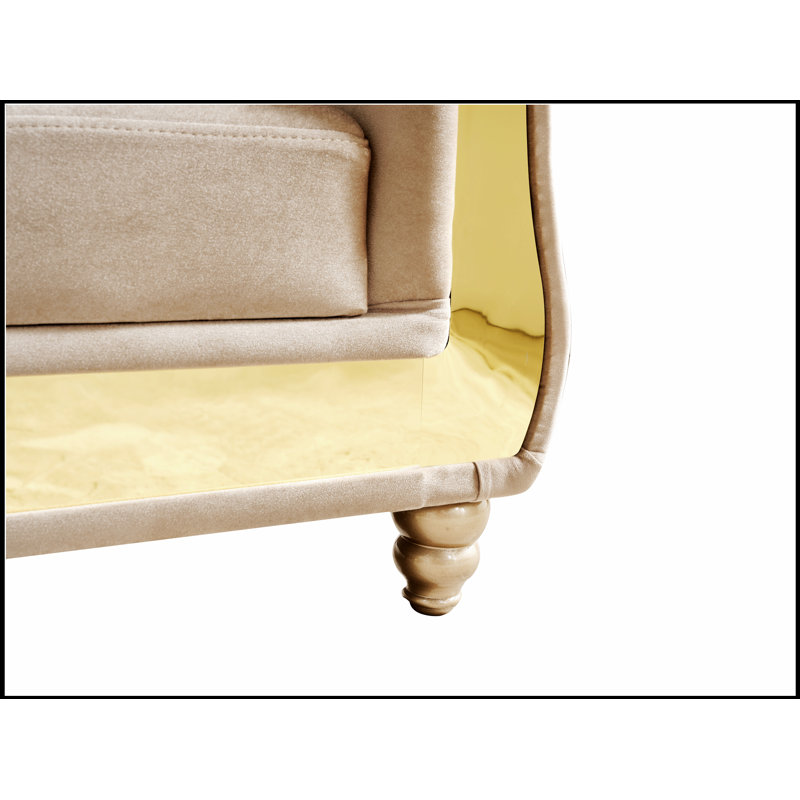 Canapé modulaire luxueux en velours capitonné avec base en bois, parfait pour les espaces de vie élégants et confortables.