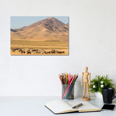 USA, Utah, Tooele County. Wild Horse Herd Grazing. by Jaynes Gallery - Wrapped Canvas Print