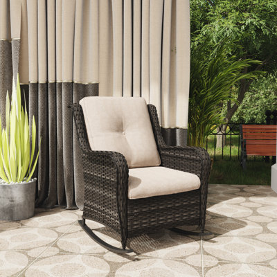 Outdoor Spencerian Rocking Wicker/Rattan Chair with Cushions by Red Barrel Studio