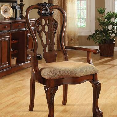 Pair of high back dining chairs with maroon fleur de lys upholstery