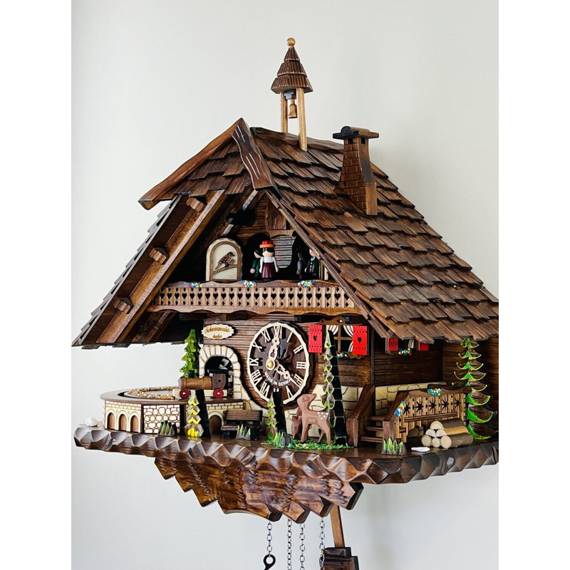  Horloge coucou à quartz avec tour de train rotatif, cloche et danseurs