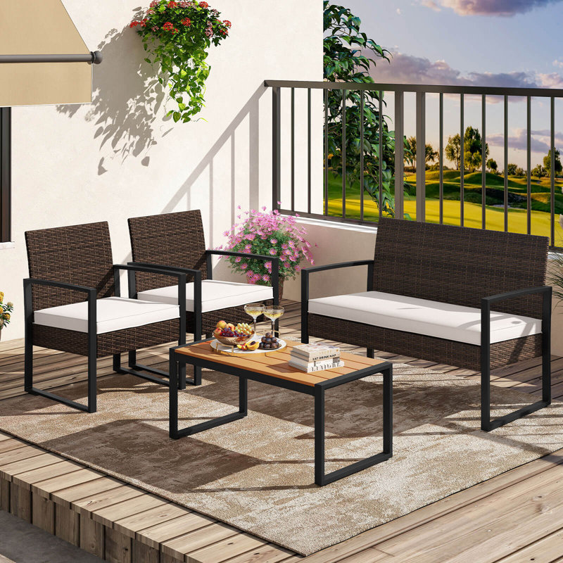 Ensemble de meubles de patio 4 pièces avec chaises rembourrées et table basse en bois et plastique