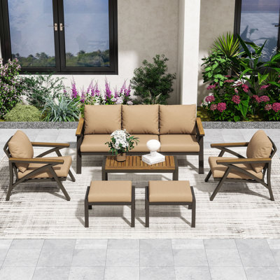 Ensemble de conversation de patio 6 pièces avec table basse, canapé, chaises, repose-pieds et coussins en bois d'acacia